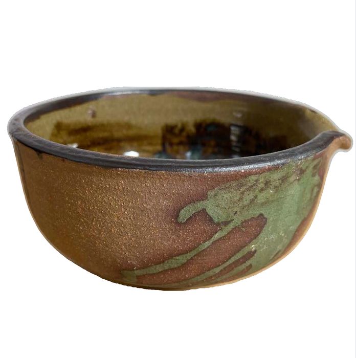 Handcrafted Ceramic Mixing Bowl Featuring earth-toned reactive brown and green glaze