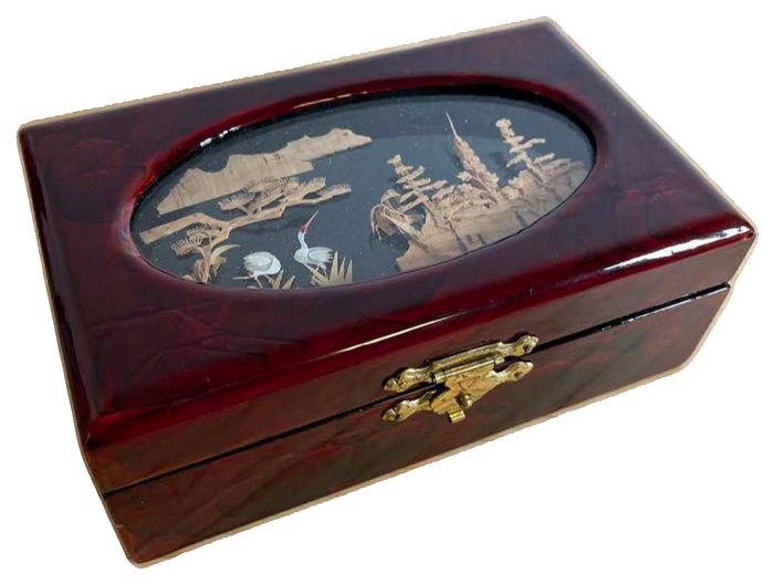 Vintage Chinese red lacquer jewelry box featuring a 3D cork diorama lid